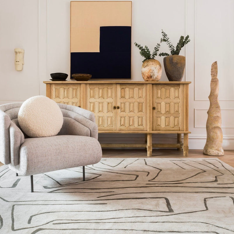 Luxury handmade wool rug in a styled living room