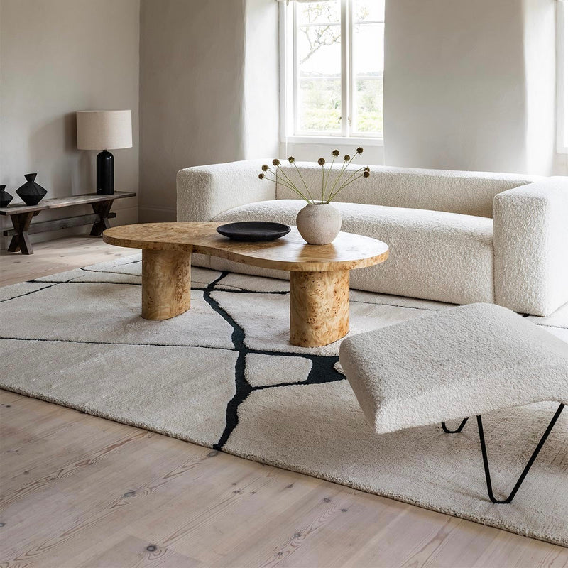 Hand-knotted wool rug delivered and styled in an Indian living room