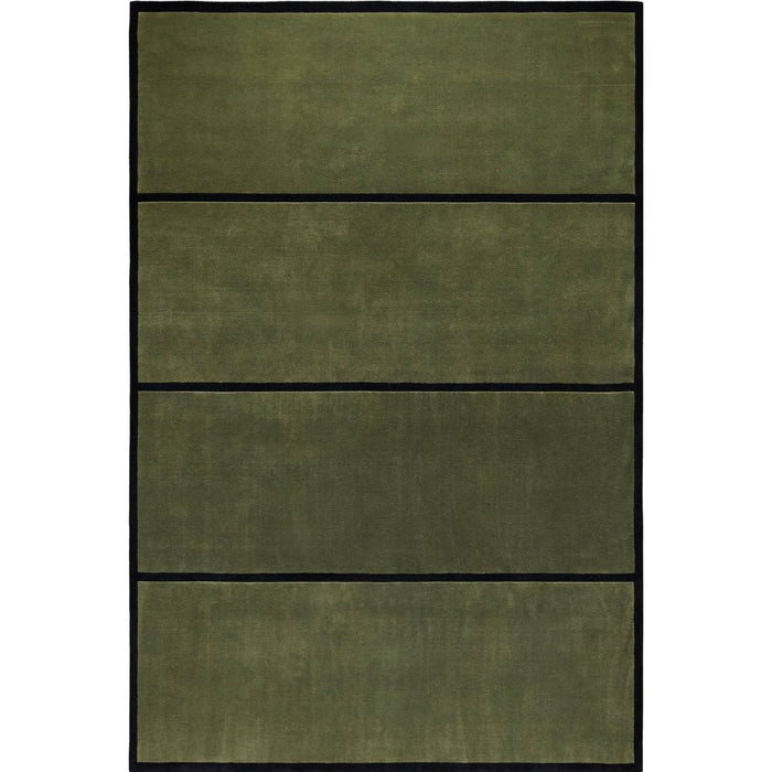 Hand-knotted wool rug styled at a home entryway