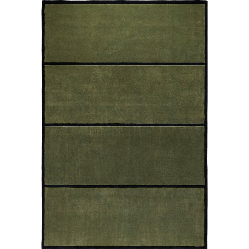 Hand-knotted wool rug styled at a home entryway