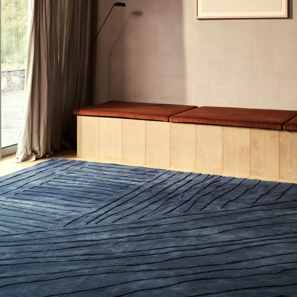 RUGKARI Reverie solid pure New Zealand wool luxury rug styled in an Indian living room - image 3