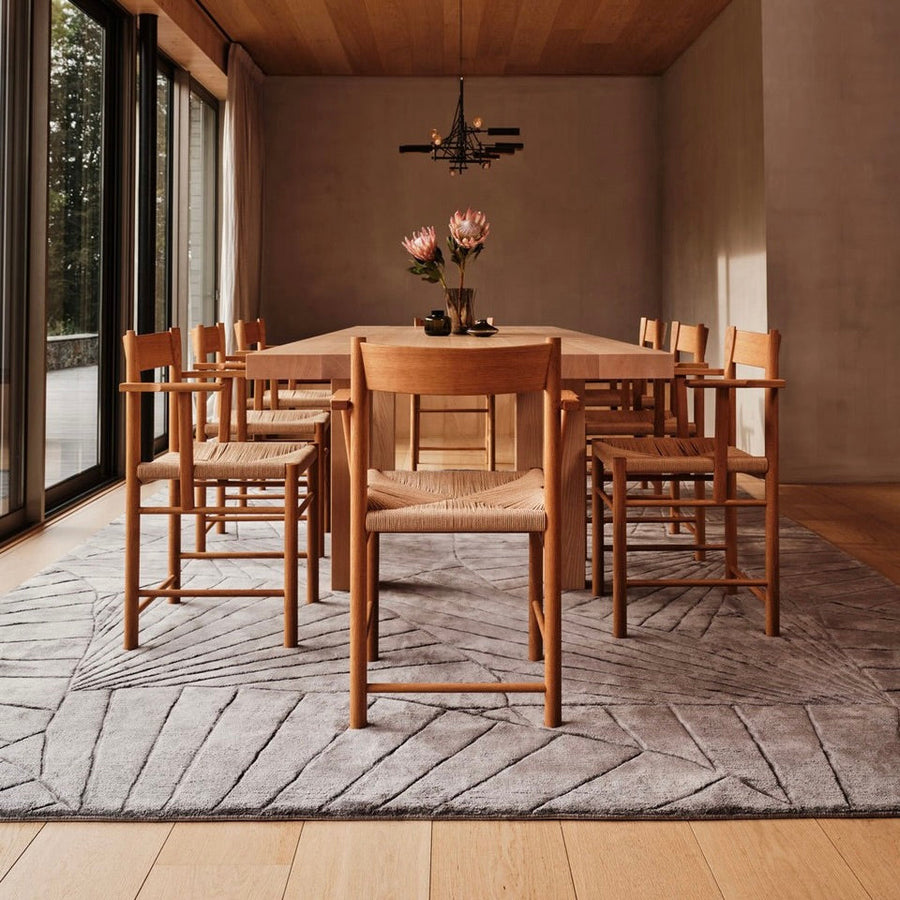 RUGKARI Nautilus solid pure New Zealand wool luxury rug styled in an Indian living room - image 2