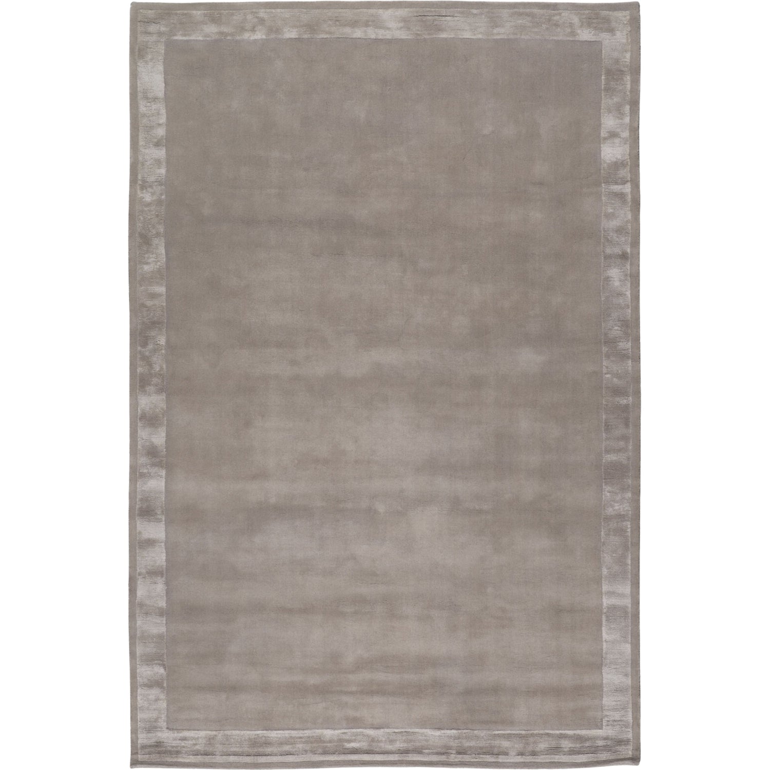RUGKARI Greige solid pure New Zealand wool luxury rug styled in an Indian living room - image 1