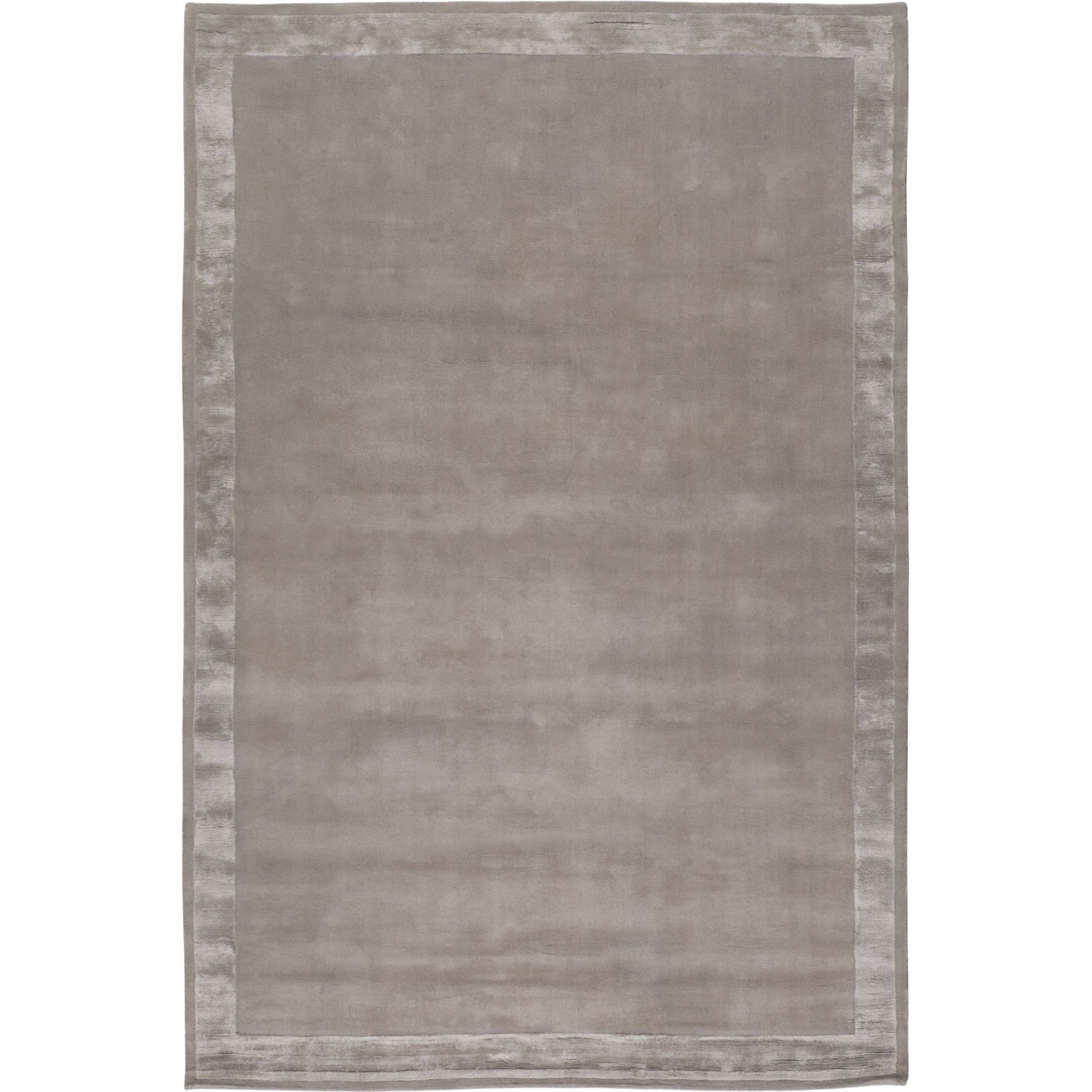 RUGKARI Greige solid pure New Zealand wool luxury rug styled in an Indian living room - image 1