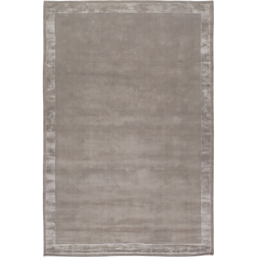 RUGKARI Greige solid pure New Zealand wool luxury rug styled in an Indian living room - image 1