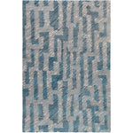 RUGKARI Indigo geometric pure New Zealand wool luxury rug styled in an Indian living room - image 1