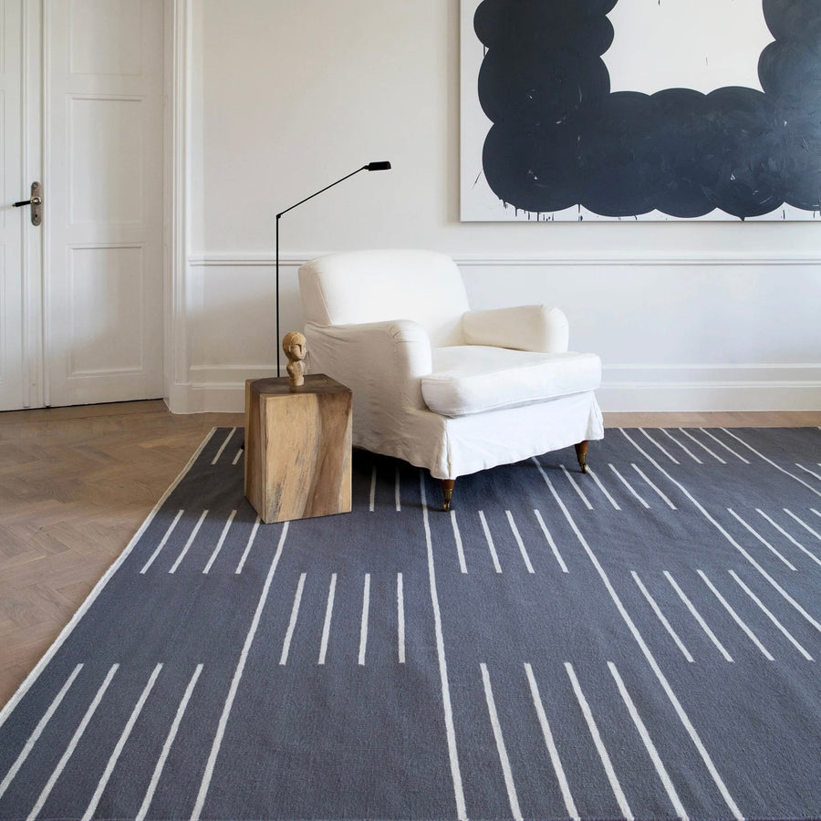 RUGKARI Chronicle designer pure New Zealand wool luxury rug styled in an Indian living room - image 2