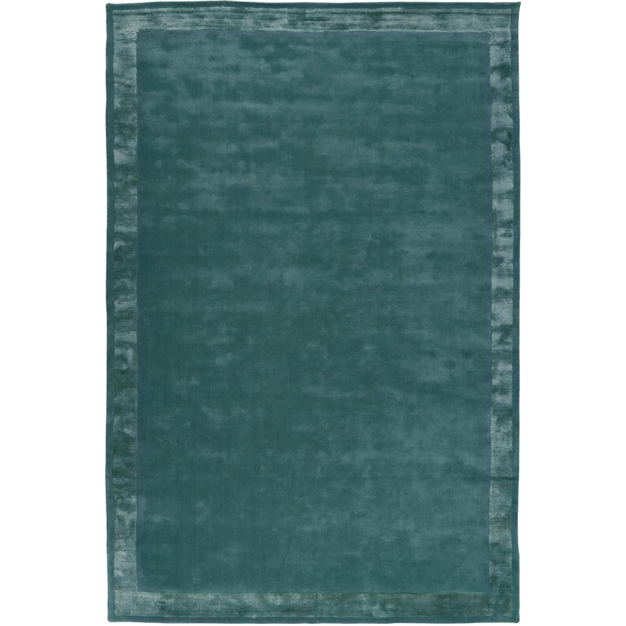 RUGKARI Verdant solid pure New Zealand wool luxury rug styled in an Indian living room - image 1