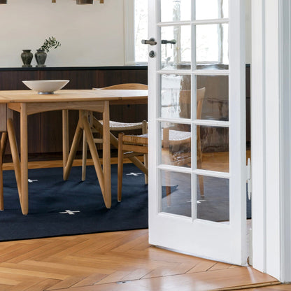 RUGKARI Constellation traditional pure New Zealand wool luxury rug styled in an Indian living room - image 2