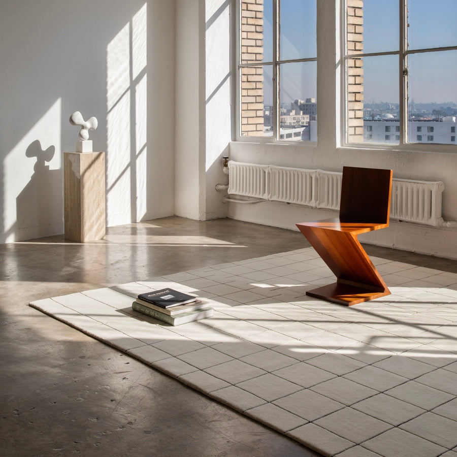 RUGKARI Grid geometric pure New Zealand wool luxury rug styled in an Indian living room - image 2
