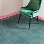RUGKARI Verdant solid pure New Zealand wool luxury rug styled in an Indian living room - image 2