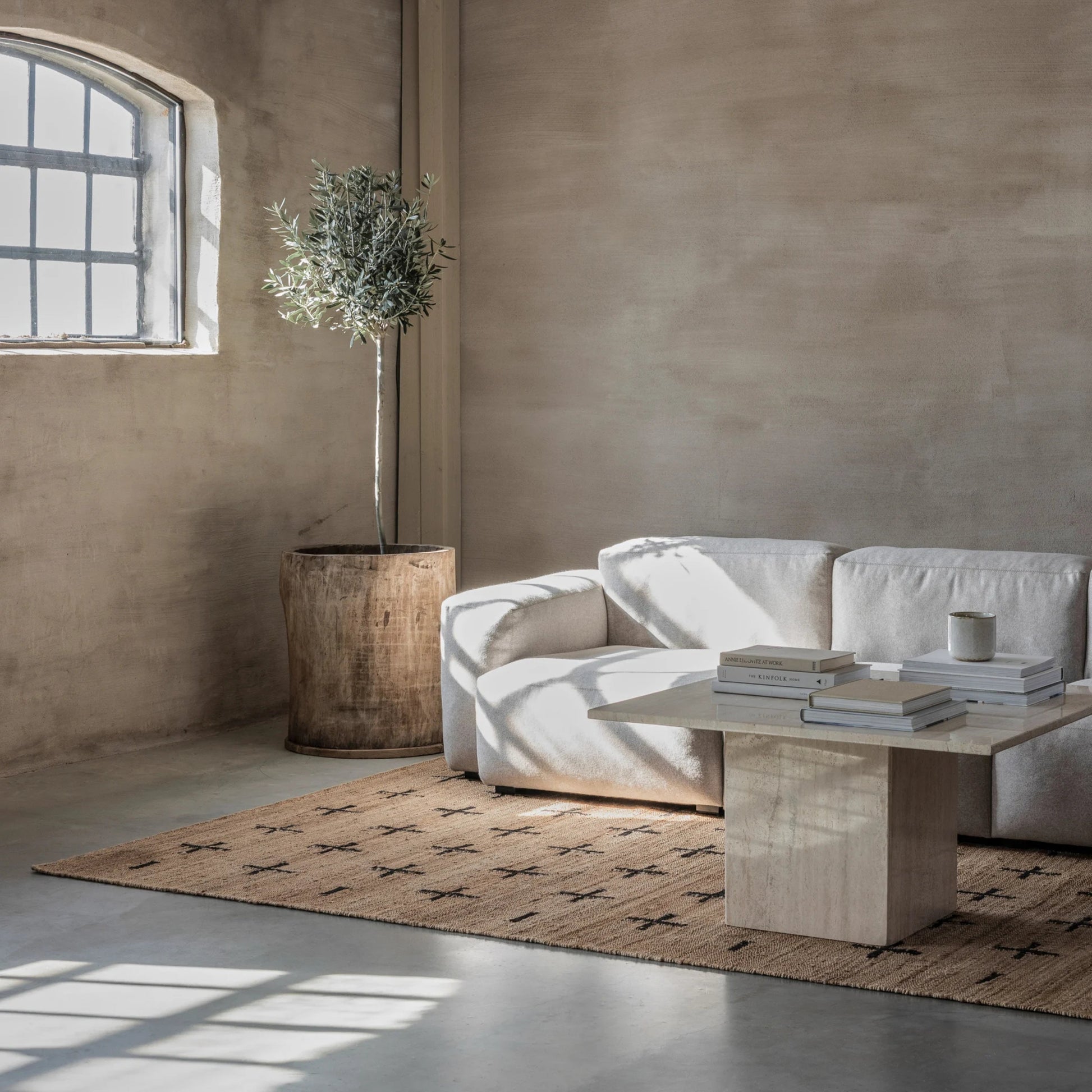 RUGKARI Solum designer pure New Zealand wool luxury rug styled in an Indian living room - image 2