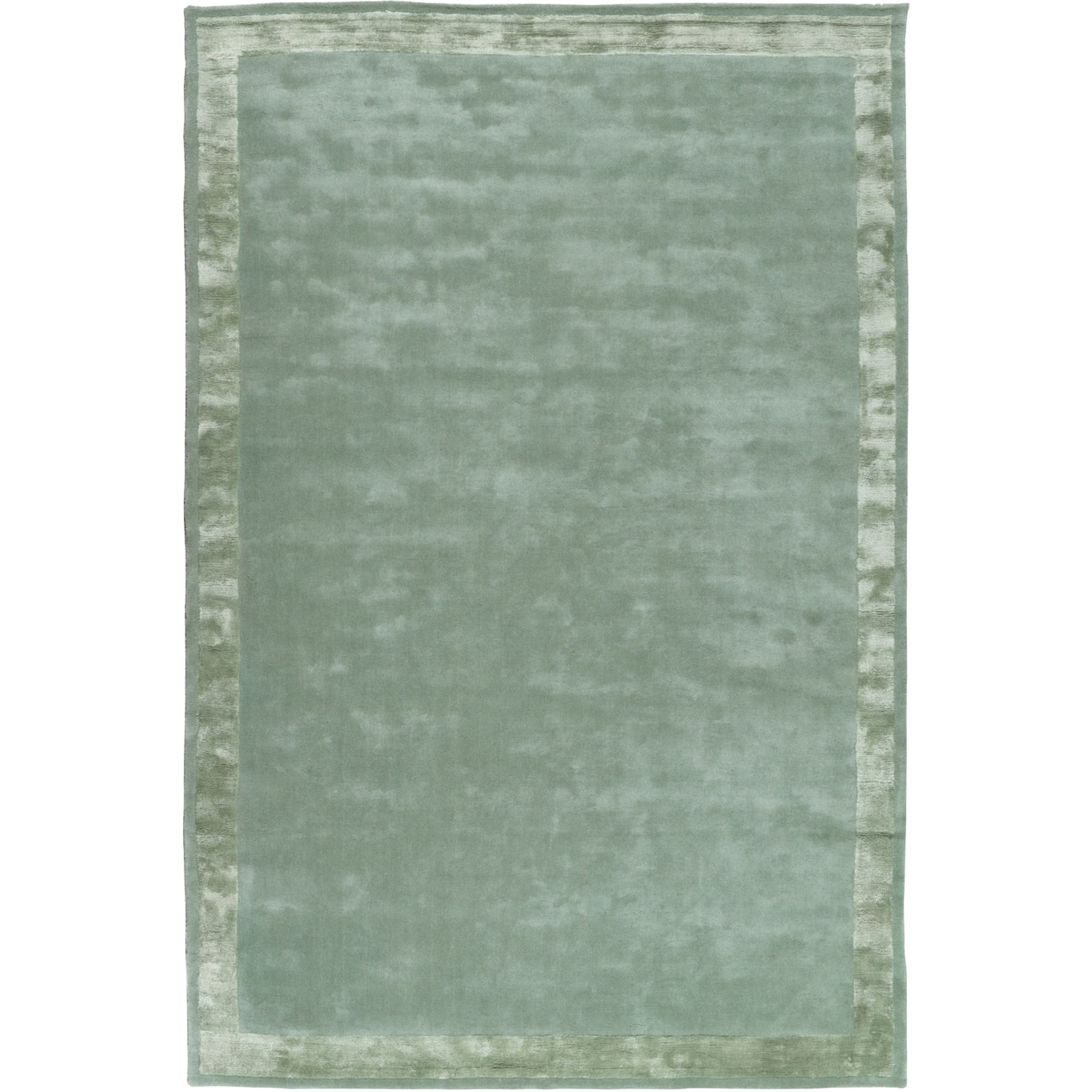 RUGKARI Limen solid pure New Zealand wool luxury rug styled in an Indian living room - image 1