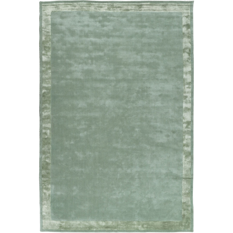 RUGKARI Limen solid pure New Zealand wool luxury rug styled in an Indian living room - image 1