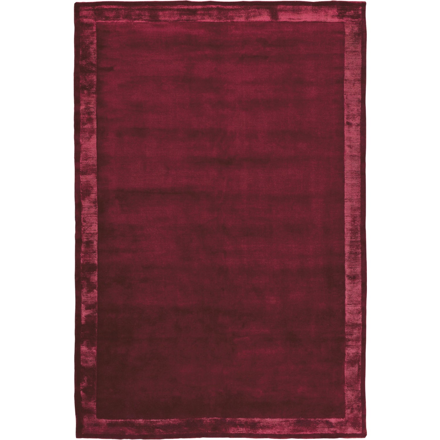 RUGKARI Claret solid pure New Zealand wool luxury rug styled in an Indian living room - image 1