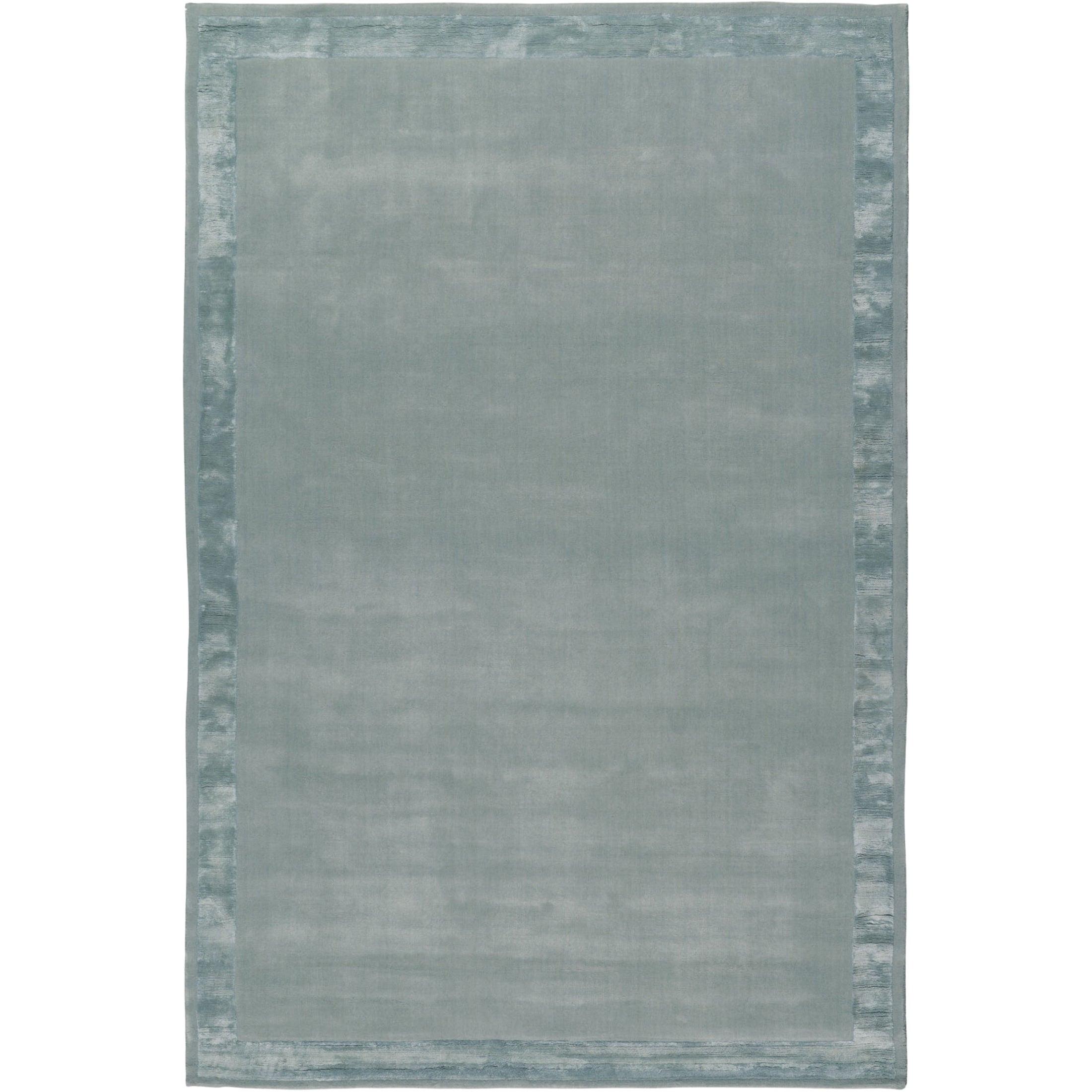 RUGKARI Haze solid pure New Zealand wool luxury rug styled in an Indian living room - image 1