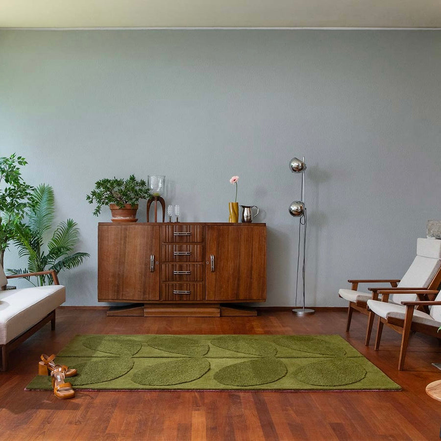 RUGKARI Tropical floral pure New Zealand wool luxury rug styled in an Indian living room - image 2