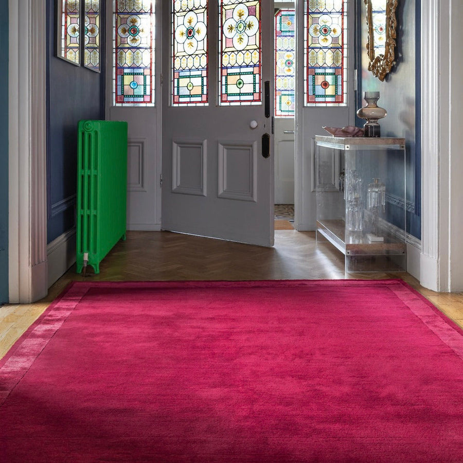 RUGKARI Claret solid pure New Zealand wool luxury rug styled in an Indian living room - image 2