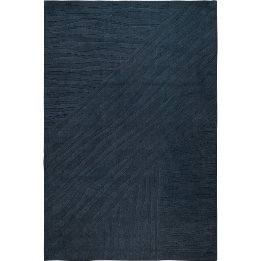 RUGKARI Reverie solid pure New Zealand wool luxury rug styled in an Indian living room - image 1