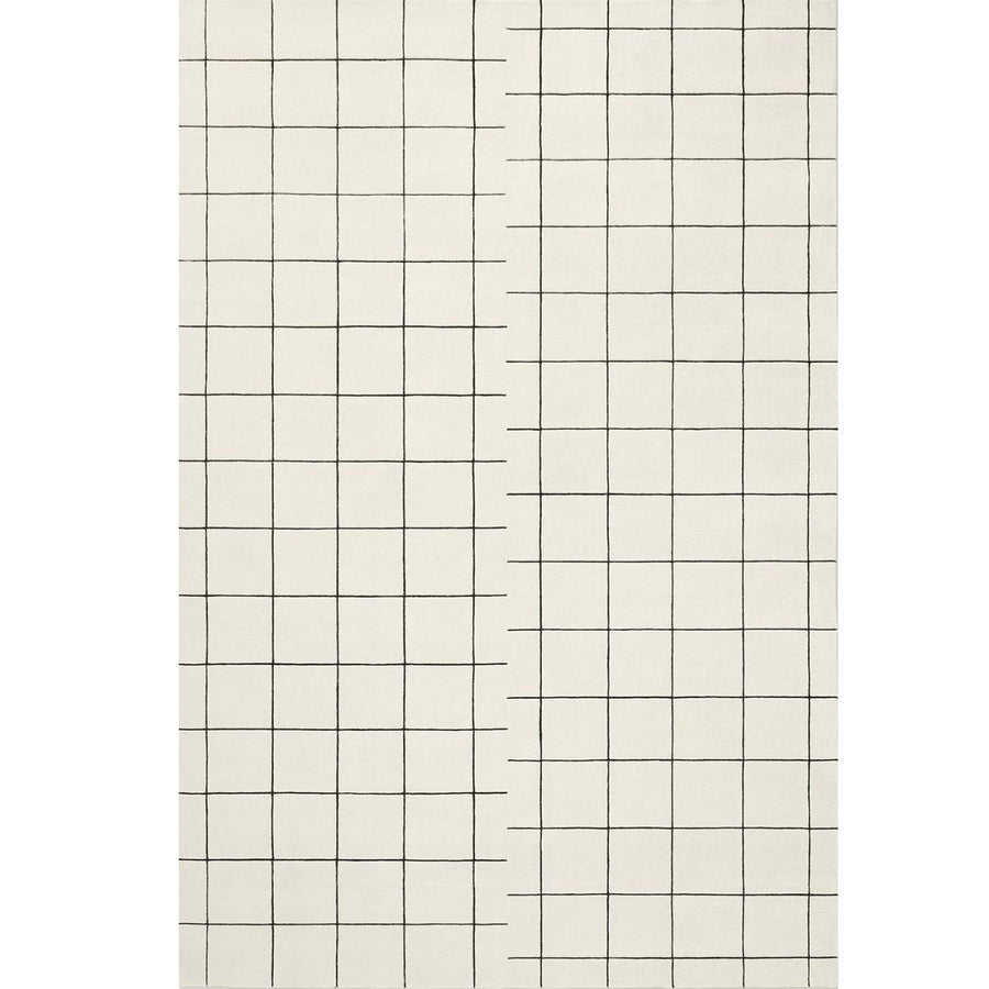RUGKARI Grid geometric pure New Zealand wool luxury rug styled in an Indian living room - image 1