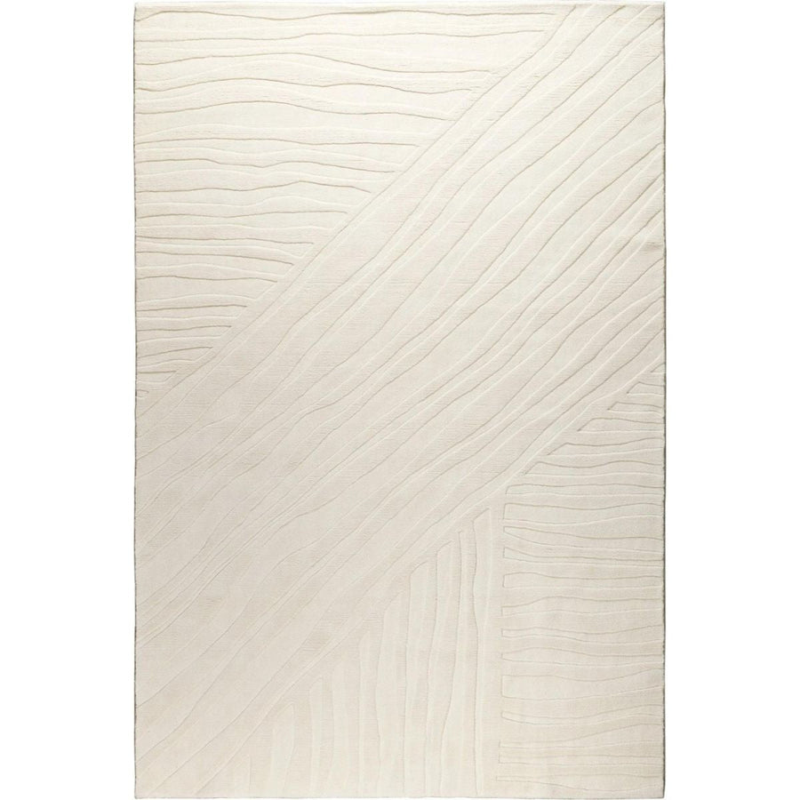 RUGKARI Minimalist solid pure New Zealand wool luxury rug styled in an Indian living room - image 1
