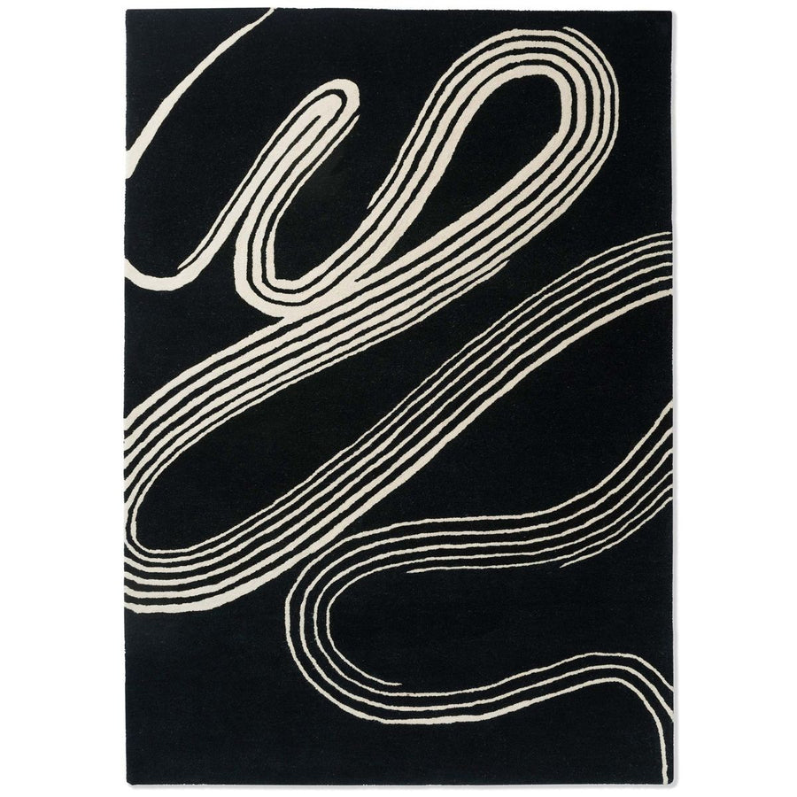RUGKARI Noir abstract pure New Zealand wool luxury rug styled in an Indian living room - image 1